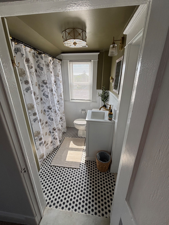 Full bathroom, tub and shower. - Nice, spacious one bedroom apartment .