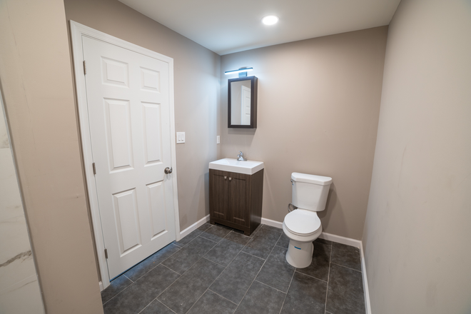 Bathroom - Modern Studio A Block from Campus Apartments