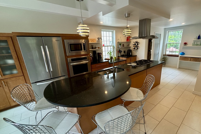 Large eat-in chef's kitchen - Charming historic home completely renovated with a modern, open interior