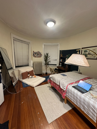 Bedroom with attached closet to the left - Close to Northeastern Campus, Whole foods, and Green Line