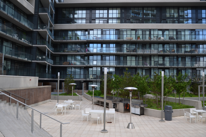 Outdoor BBQ area - Extra Large 2-Bedroom Suite in a Luxury CityPlace Condo, Utilities Included