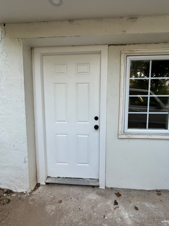 Front door - Seeking additional tenant for 2 bedroom/2 bath walking distance to campus! Duplex