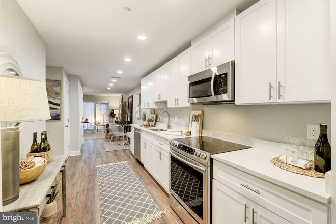 Kitchen - view from entry - Modern 2BR / 2BA Close to Campus Condo