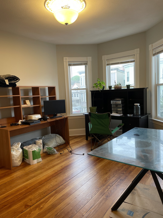 living - STUNNING 4 BED/2 BATH WITH IN-UNIT LAUNDRY, NO BROKER FEE!! 9/1/26!!! Apartments