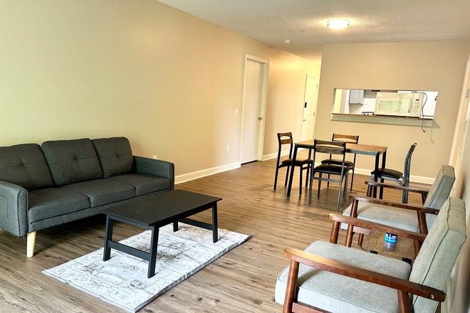 Livingn Room - Room with Private Bathroom - Condo at University Commons 303 Smith Level Road