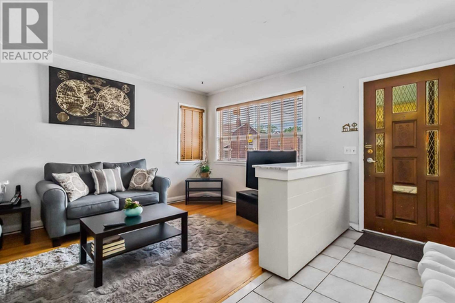 Living room - Furnished Bedroom in Christie Pits Area -- All utilities incl.