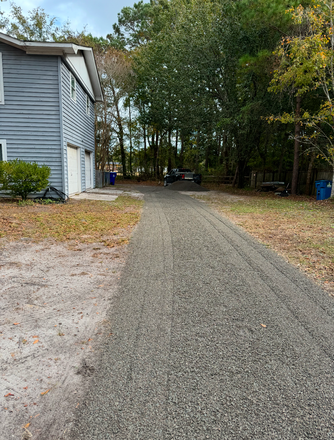 Driveway - 2nd floor of duplex. Newly renovated. 3 rms 2 bath. Pets welcome. Fenced in yard. 5 mls to beach Duplex