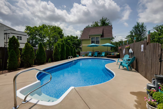 Pool Looking to Rear Pool-house - 3.3 Miles to Vanderbilt - 3 Bed House w Pool in The Nations
