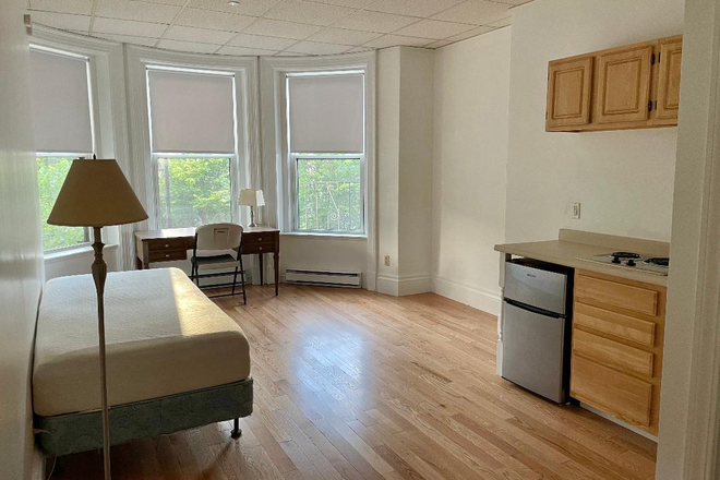 living space - FURNISHED!! Studio / 1 Bed w/ Hot Water Included! Available 9/1/24!!