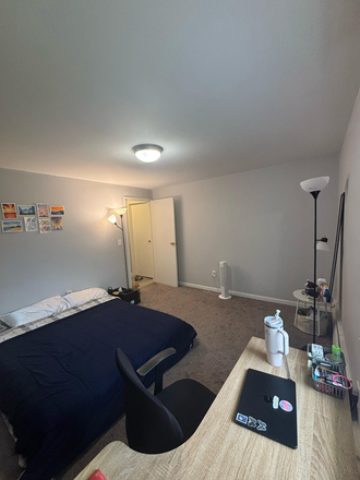 Fully Furnished Bedroom with Carpet - Lease Transfer at The Boulders Apartments