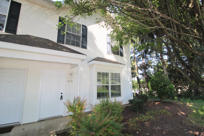 front of home - This townhome will be available in the summer of 2025 for the 25/26 school year! - 578 Pheasant Run