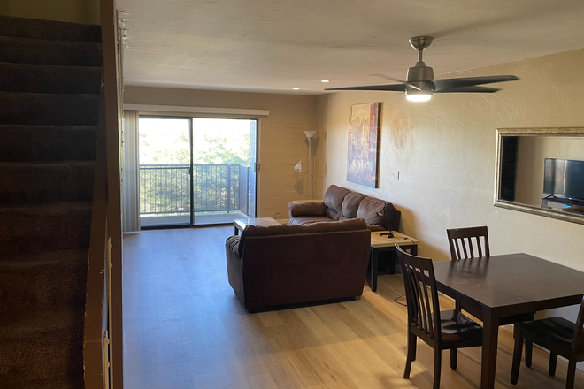 New flooring! Dining/ Living area - Campus Walk Condominiums