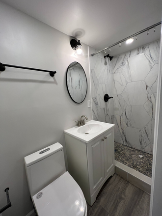 Newly renovated bathroom - ABINGTON: Newly renovated 1 bedroom apartment w/ new washer/dryer