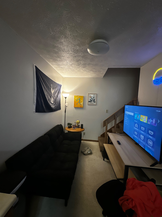 Not the living room. Area between the kitchen and stairs - Ardent Woods