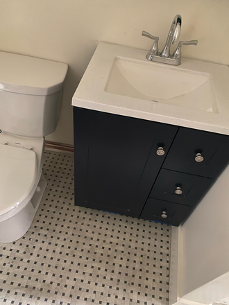 bathroom - Available 7/1/25 Center of Town 3 bedroom featuring gleaming hardwood floors, high ceilings Apartments