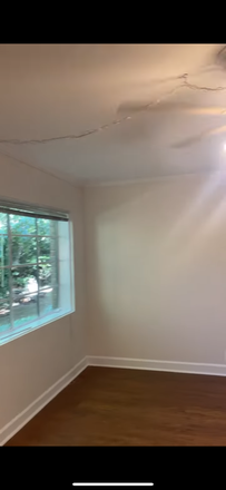 Living room - Charming 1br, 1ba w/porch $1300 if disc earned (incl gas, water). Emory/DruidHills/ViHi Condo