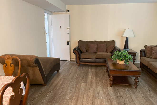Bright open layout as you enter—living room flows into kitchen, perfect for students. - Affordable Housing – Easy Access to Loyola, John Hopkins Homewood, Morgan