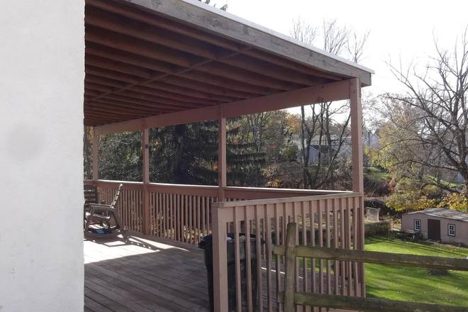 Large Deck off of the Eat-In-Kitchen - Single Home with large backyard - Student Approved Housing