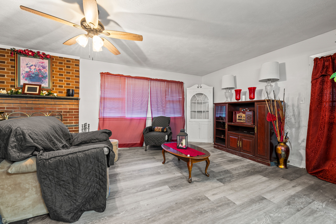 Here is a professional and inviting description for the living room at 102 Adams Drive. I’ve included a few options depending on the "vibe" - Private Furnished Room Minutes from Liberty University House