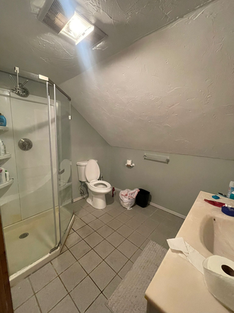 Spacious bathroom. - Spacious and Full of Light - Attic Room Apartments