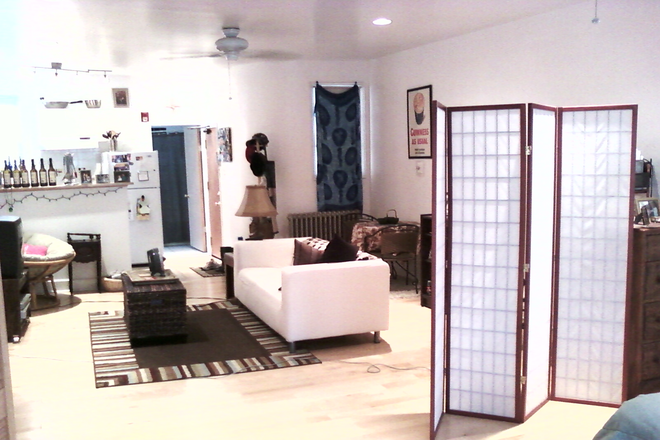 living room to kitchen - quiet, updated and centrally located 1 bedroom or studio close to campus Apartments