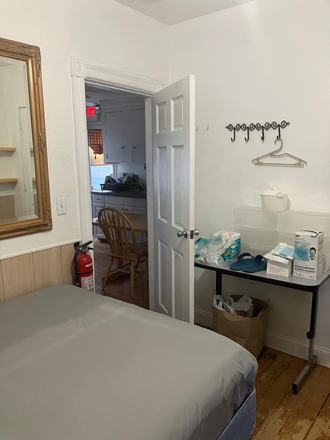 kitchen view of bedroom - 2 private rooms includes all utilities, available mid May 2026. Apartments