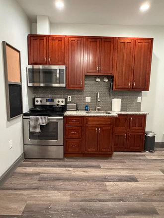 kitchen - Fully Furnished Studio Available One Block from Peabody Shuttle Stop
