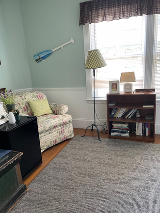 sitting room with couch, chair, desk, bookcase closet - Cottage House. Room with queen bed/second floor +sitting room.  Kitchen/laundry privileges