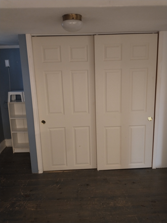 Bedroom double closet - 1 furnished one-bedroom basement apartment with laundry facilities and all utiliti