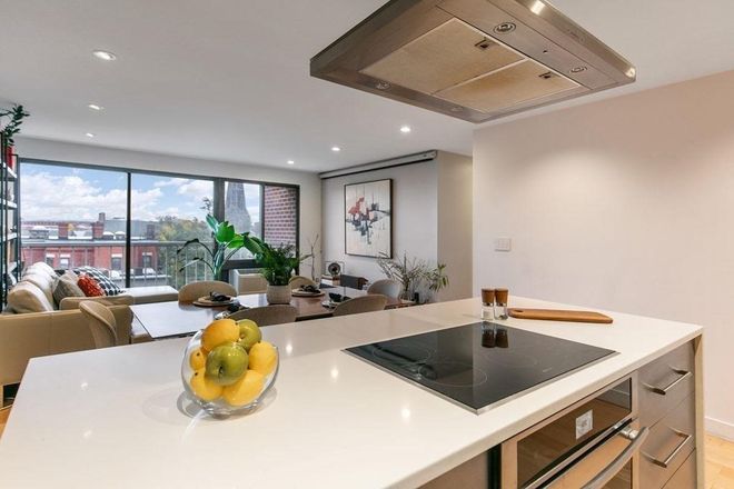 Kitchen Island and Living Room - Apartment w/great view, walking distance to Harvard Square