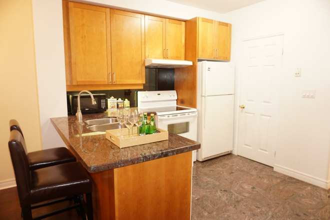 Kitchen with ceramic floor - Safe & Central Student Condo for Rent – Yonge & Bloor 2bds, 1bath, Perfect for U of T & TMU Students