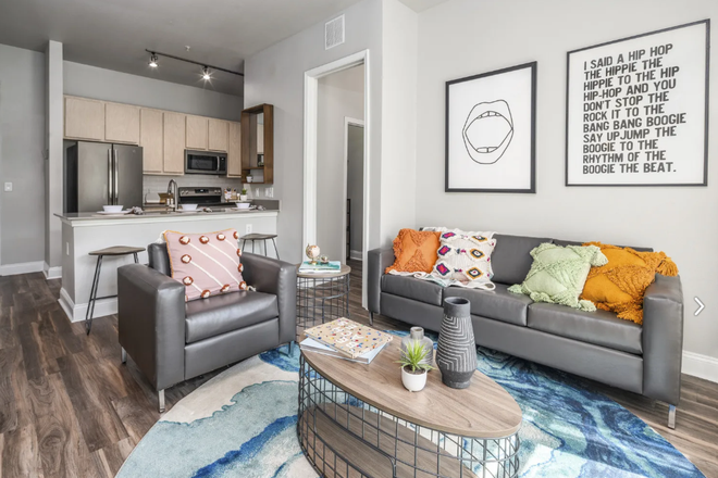 Living Room - The Aves at 12100 Apartments