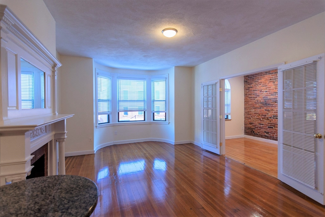 Living room - Beautiful condo, huge living room, modern kitchen, central heat/air, Washer/Dryer, private deck.