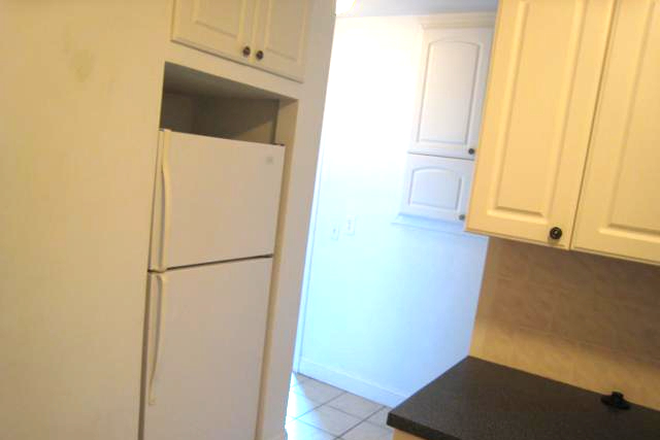 Visit hubrealtyproperties.com - BU West Campus, Beautiful 4 bedroom condo with newly renovated kitchen and bath