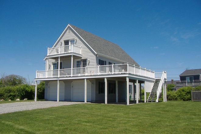Modern 1800 square foot home with large yard, large deck, top floor balcony and two car garage. - Clean, Modern Home with an Ocean View!