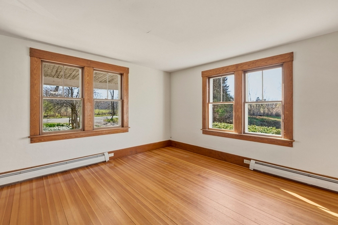 Front room - Quaint 1915 Farmhouse.  Unfurnished 4 bedrooms, workshop/office, 2 baths. Close to bus route.