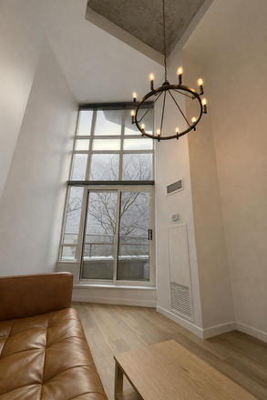 Living room - Bright 2 Level Downtown Toronto Loft with 18 Foot Ceilings, Parking, Locker and Utilities Included