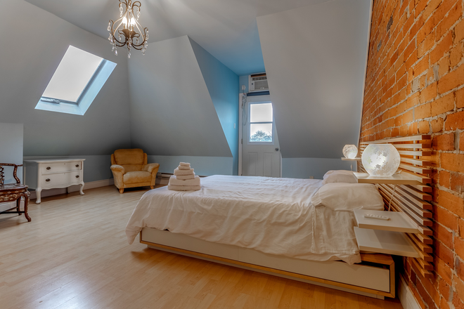 Bedroom with Skylight - Fully Furnished 2 Bedroom In Family Friendly Little Italy Walking Distance to UofT
