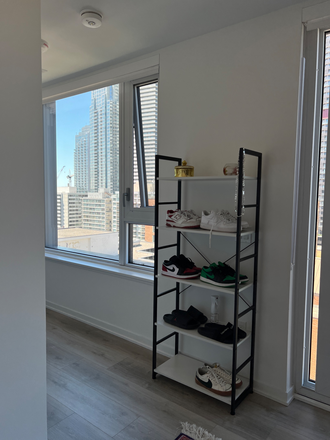 Various spaces to store items - Fully furnished bedroom in newly built Condo