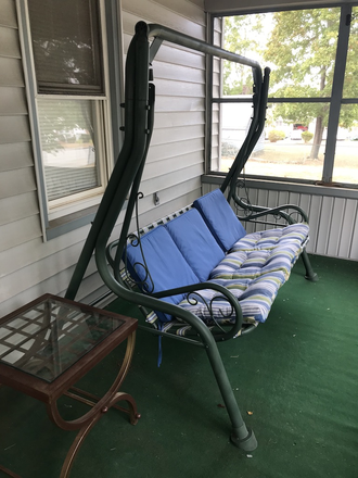 Screened in Porch Swing - Pleasant View Palace