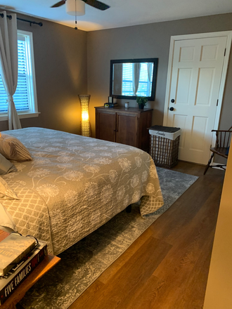 Bedroom 1 door to porch - Cozy, clean, close to campus Apartments