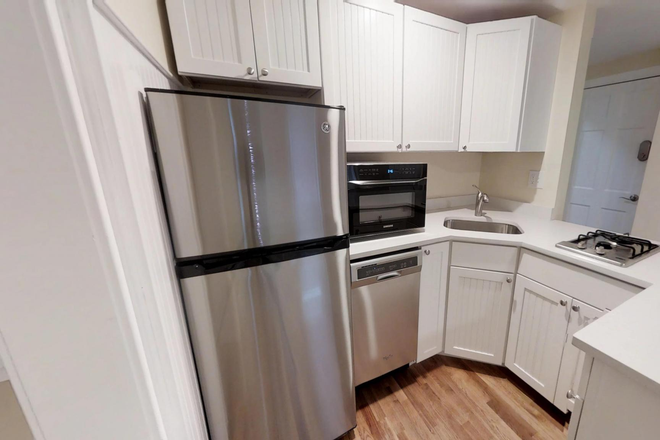 Visit hubrealtyproperties.com - Beautiful 1 bedroom with breakfast bar, laundry in unit, next to Porter Square T Apartments