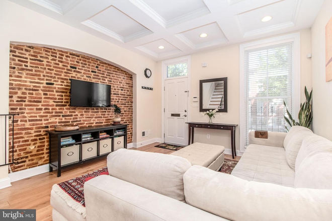 Living Room - Spectacular, fully renovated 3 bd/3 bth townhome.  Blocks from JHMC in beautiful Butcher's Hill.