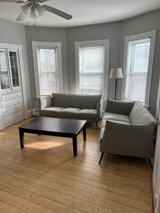 Living room - Private bedroom, bathroom, and study in a large 1500 sq ft apartment in Magoun Square