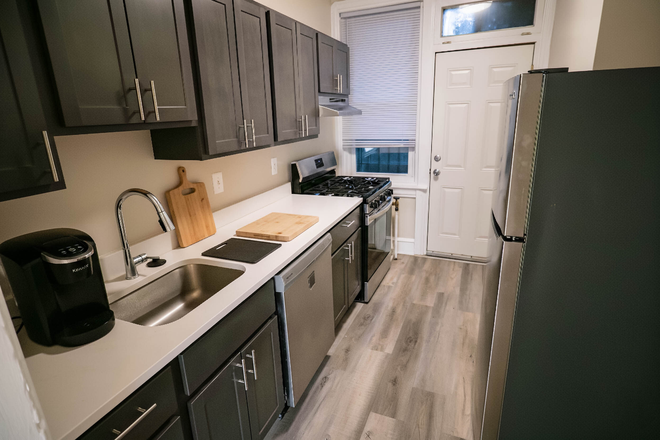 Osage Manor B1 Kitchen - University City Housing Apartments