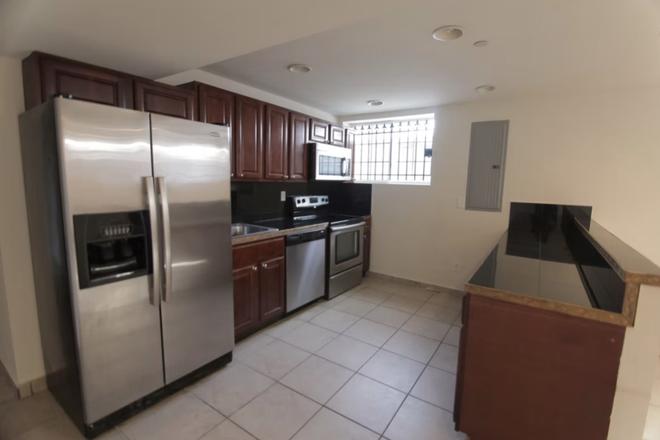 Full kitchen with a dishwasher and oven. - Off Campus Housing, Close to Campus