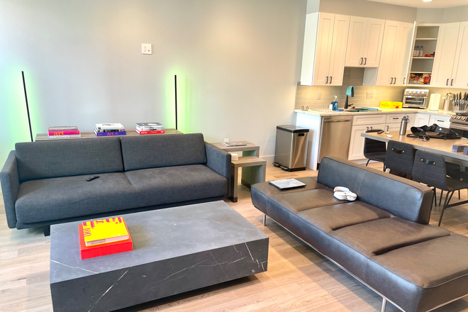Living Room Relax in a bright, open-concept living space designed for comfort and connection. Oversized windows fill the room with natural l - The Arietta at Park View Headline: Modern 2BR Executive Residence with Reserved Parki Condo