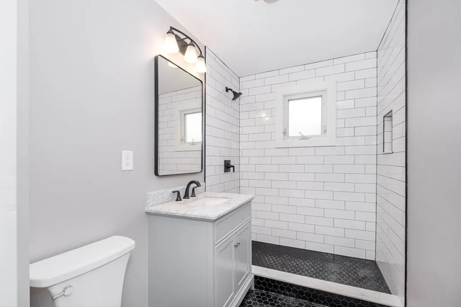 Outgoing Residents bathroom - Newly Renovated Unit 15 mins from BC Campus & Fenway! Apartments