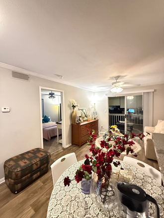 Living Area - Charming 1BHK with Patio & Lively Outdoor View