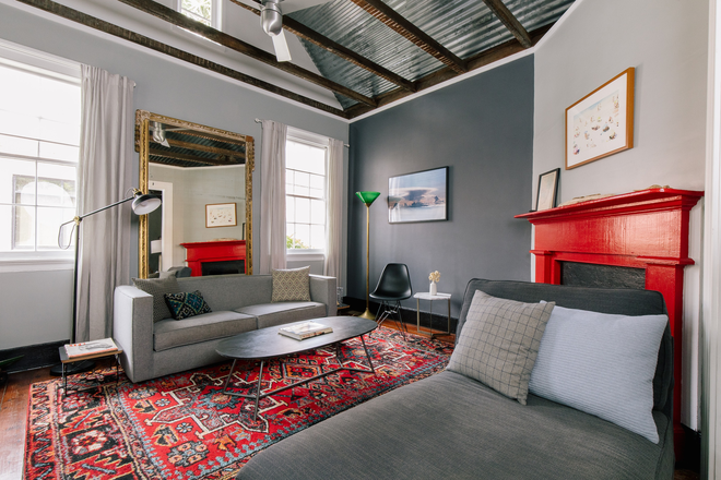 Open concept Living room with exposed ceiline - Historic Design Freedman's Cottage House